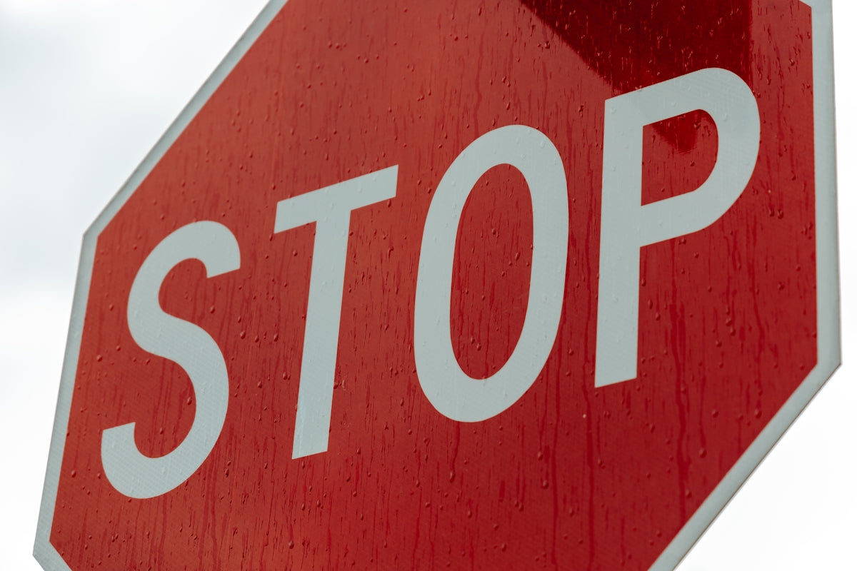 a red sign with white letters