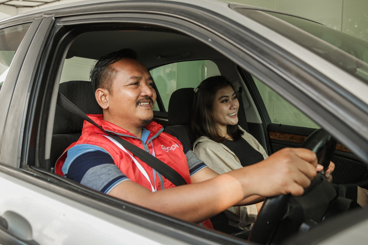 a man and woman in a car