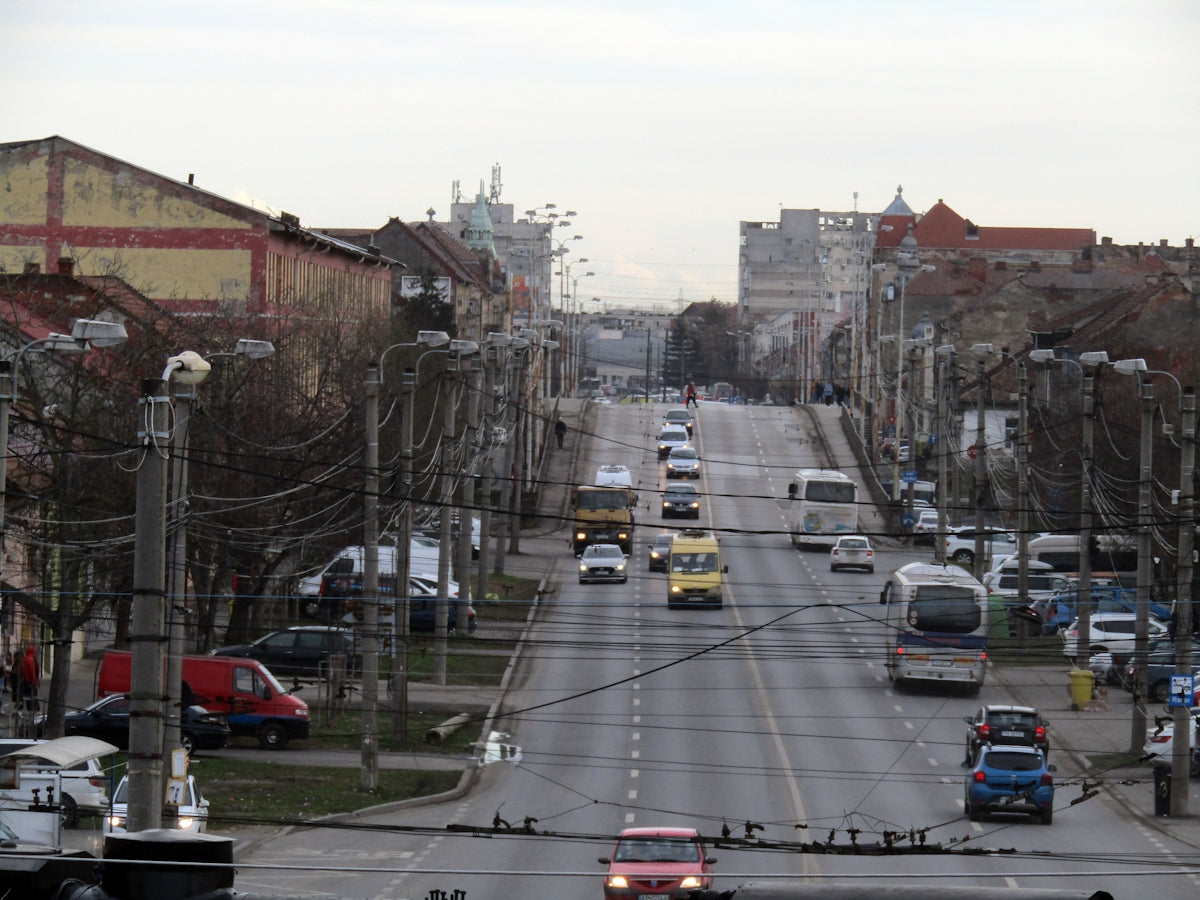 A city street filled with lots of traffic