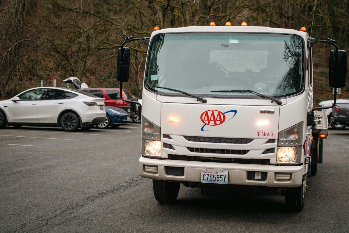 Aaa tow truck arrives at the scene