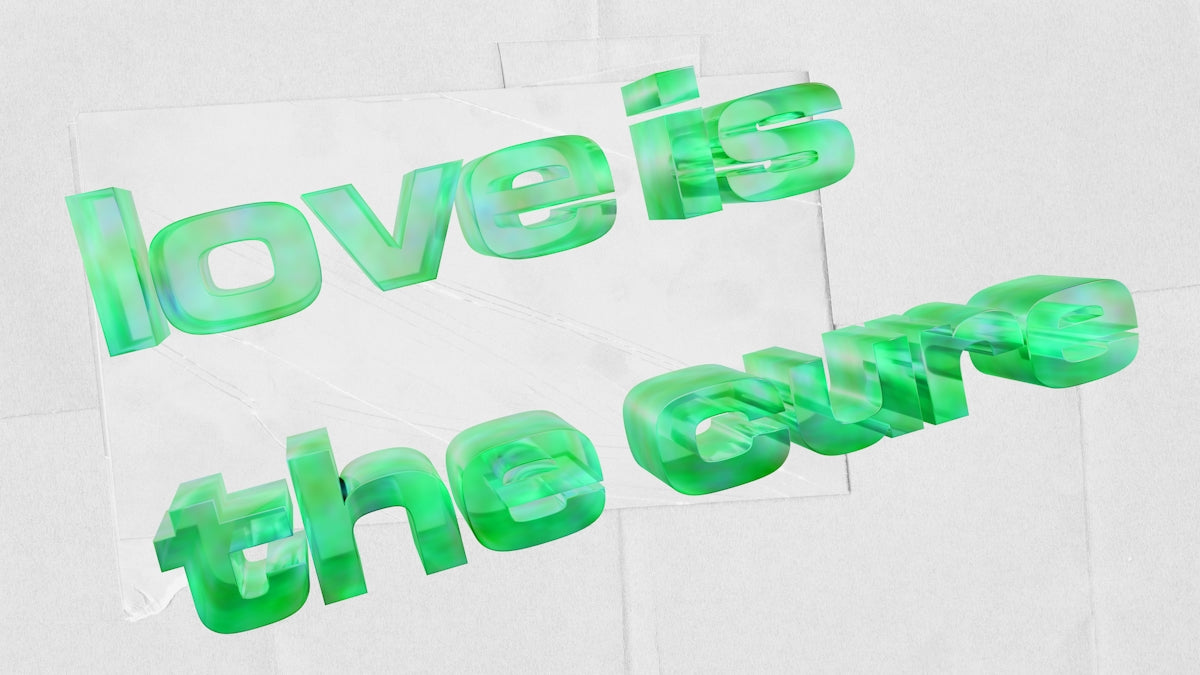 Green 3D text reading love is the cure